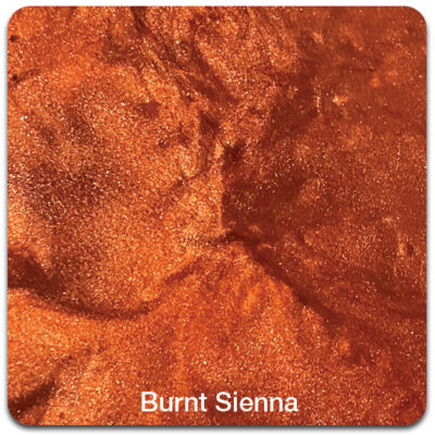 Close-up of a metallic, shimmery burnt sienna surface with text "Burnt Sienna" at the bottom.